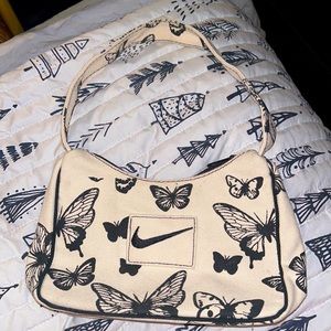 Super adorable Nike butterfly purse ! Like new